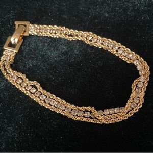 Gold plated tennis style link bracelet with cz accents